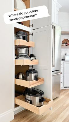 an open kitchen cabinet with pots and pans on the bottom shelf that says, where do you store small appliances?