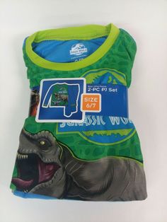 JURASSIC WORLD Dinosaurs Kids PJs 2pc Set Long Sleeve Flannel Pajamas Size 6/7. Casual Green Dinosaur Print Sets, Casual Green Sets With Dinosaur Print, Cotton Long Sleeve Dinosaur Print Set, Cotton Long Sleeve Sets With Dinosaur Print, Jurassic World T Rex, Halloween Pjs, Elf Pajamas, Panda Hoodie, Dinosaur Pajamas