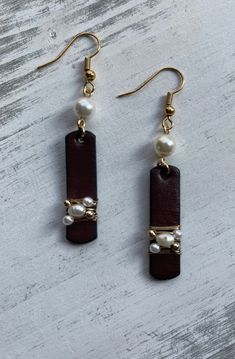 Leather and Glass Pearl Dangle Earrings | 2.25 inches by ByWanderingVines on Etsy Elegant Leather Earrings As Gift, Elegant Leather Earrings For Gift, Elegant Leather Earrings Perfect For Gifts, Elegant Leather Earrings With Ear Wire, Brown Pearl Drop Earrings As Gift, Brown Pearl Drop Earrings For Gift, Octopus Bracelet, Pearl Dangle Earrings, Pearl Earrings Dangle