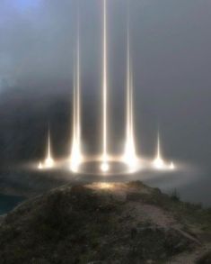 an artist's rendering of light emitting from the top of a mountain