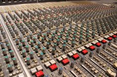 the sound board has many different colored knobs