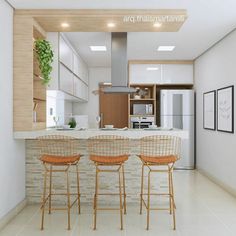 three stools are in front of the kitchen counter