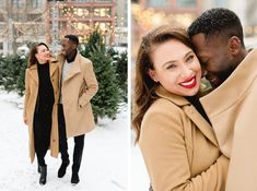 a man and woman standing next to each other in the snow with christmas lights behind them