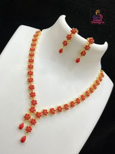 American Diamond Multicolor Gemstone Necklace Set, a luxurious addition to any formal or celebratory attire. Intricately crafted with the lustrous sparkle of American diamonds and a symphony of colored stones resembling ruby, emerald, and sapphire hues, this necklace exudes royalty. Accented with red coral and timeless pearls, the set includes a pair of matching earrings that gracefully complement the necklace. Whether for a wedding, gala, or special cultural event, this necklace set is sure to make a statement and cherish your moments. Coral Necklace Indian Gold, Trendy Ornaments, Pearl Necklace Indian, Ruby Necklace Designs, Pearl Locket, Coral Jewellery, Red Stone Necklace, Coral Jewelry Set, Bridal Jewelry Sets Brides