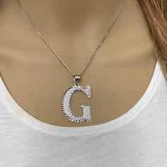 925 Sterling Silver Diamond Cut Initial Large Letter G Pendant Necklace Metal: 925 Sterling Silver Pendant: Large Height: 1.8" (45.7 Mm) Width: 1.1" (28 Mm) Rolo Chain In 16", 18", 20", 22" Brand New With Box Available In Any Letter From A-Z Pendant Can Be Available In Small Or Medium Size In Different Listings, Available In 10k, 14k, Or Sterling Silver Made To Order. Might Take 3-5 Days To Be Shipped. Letter J Pendant Necklace Is For Size Demo. Available In Another Listing. Silver Initial Necklace With Round Shape, Silver Round Initial Clavicle Necklace, Silver Initials Pendant Necklace, Silver Initial Pendant Clavicle Chain Necklace, Silver Initial Necklace With Clavicle Chain For Anniversary, Engraved White Gold Initial Necklace In Sterling Silver, Personalized Silver Initial Pendant Jewelry, Engraved Initial Necklace In Sterling Silver, Engraved Sterling Silver Initial Necklace In White Gold