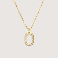 A gold chain and pendant, inspired by the interlinking of cufflinks, brings this necklace to life. As part of our Tailored Collection we studied all elements of suiting, and were fascinated by how a cufflink weaves itself through a button hole and connects to offer a practical yet beautiful finish. The oval pendant with diamond tracing hangs onto the chain with a hook that has a diamond at its center. The frame of the pendant measures 17mm and has 25 diamonds set within. If ordered in rose gold, the chain will be our Rollo chain. All features can be customized! Please contact us if you wish to make changes, we love making custom designs. All of our jewelry is carefully handmade in our atelier. *HC diamond are all conflict-free diamonds To order by phone 972-72-2991000 Gold Plated Link Chain Necklace Fine Jewelry, Luxury Yellow Gold Clavicle Chain Jewelry, Luxury Yellow Gold Jewelry With Clavicle Chain, Luxury Yellow Gold Clavicle Chain, Elegant Diamond Chain Necklaces, Classic Chain Necklace With Pendant For Formal Occasions, Luxury Yellow Gold Jewelry With Adjustable Chain, Classic Pendant Chain Necklace For Formal Occasions, Formal Clavicle Chain Necklace