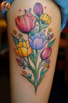 a woman's thigh with colorful flowers on it