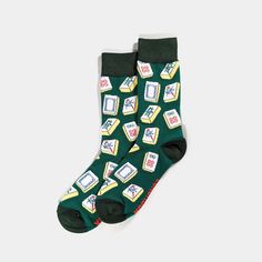 Step up your sock game with our Mahjong Socks. These cotton crew socks bring a playful twist to your daily outfit with unique patterns inspired by everyone's favorite game, Mahjong. You know what might be more impressive than the Seven Wonders of the world? The Thirteen Wonders of Mahjong (十三么/ShíSānYāo)!! Ok, jokes aside, these green socks are bound to bring you good luck, let it be at the Mahjong table or just for anything and everyday in general! Features Soft and breathable cotton fabric blend Reinforced toe and heel for added durability Measurement Classic crew socks fit, sitting comfortably mid-calf. Materials 80% Cotton, 15% Polyester, 5% Spandex Care Instructions Machine Wash Cold | Tumble Dry Low | Iron Medium | Do Not Bleach 2.8% For The Planet The Paris Agreement has a goal guid Mahjong Tiles, Unique Socks, Green Socks, Paris Agreement, Sock Game, Novelty Socks, Patterned Socks, Novelty Items, Mens Socks