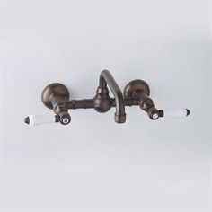 the two handle faucet is shown in bronze