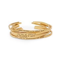 The Narrow Cuff is a timeless piece perfect for everyday wear. Crafted in your choice of solid gold or sterling silver, this delicate cuff stacks well with other jewelry. With simple yet sophisticated styling, this bracelet will make a lasting addition to your jewelry collection. Engravable for an added touch of personalization. Stackable 14k Gold Cuff Bracelet For Everyday, Everyday Stackable 14k Gold Cuff Bracelet, Everyday 14k Gold Stackable Cuff Bracelet, Dainty Adjustable Cuff Bracelet For Anniversary, Gold Sterling Silver Cuff Jewelry, Minimalist Gold Cuff Bracelet In Sterling Silver, Everyday Sterling Silver Gold Bangle, Adjustable Yellow Gold Cuff Bracelet For Everyday, Stackable 14k Gold Cuff Bracelet As Gift