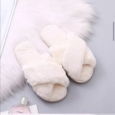 The Coziest And Softest Slipper You Will Absolutely Love And Live In! In A Beautiful Off White Color, These Slippers Will Keep You Warm And Are So Comfortable! Criss Cross Style. Faux Fur. Indoor Or Outdoors. Memory Foam Insole Makes A Perfect Gift! These Run Small, Order One Size Up For The Perfect Fit. Sizes: S (36-37) Fits 5-6 M (38-39) Fits 7-8 L ( 40-41) Fits 9-10 For Reference, I Wear A Size 7 And I Wear The Medium For The Perfect Fit. Comes In Pink- Sold Separately Faux Fur Fashion, Fur Heels, Dr Shoes, Indoor Shoes, Fluffy Slippers, Soft Winter, Soft Slippers, Faux Fur Slippers, Warm Shoes