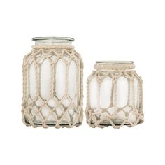 two glass jars with rope around them on a white background, one is empty and the other has a light bulb