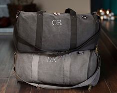 "This personalized washed canvas duffel bag is the perfect corporate gift! Made with heavyweight cotton canvas, these bags are both practical and durable. The interior contains two pockets for additional organization is fully polyester lined. Additional features include a detachable strap, and one outside pocket, and an outside zippered shoe compartment, so you can keep your shoes separate from your clothing. Personalize them to create a special, unique gift! Bag dimensions: 20\" length, 10.5\" Personalized Cotton Canvas Bag For Travel, Personalized Cotton Canvas Travel Bag, Customizable Cotton Canvas Bag For Travel, Personalized Rectangular Canvas Bag, Large Capacity Cotton Rectangular Duffle Bag, Customizable Canvas Bags For Personalized Gift, Personalized Canvas Bags For Gifts, Personalized Gift Canvas Bag, Personalized Beach Tote