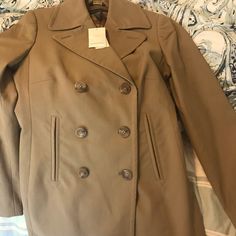 Banana Republic Light Brown/ Tan Peacoat, Faux Pockets, Extra Buttons Included. Nwt. Stored In Garment Bag. When Updating The Listing I Did Notice One 3/4 Inch Imperfection Which May Be A Pulled Thread Between The Third And Fourth Button. I’ve Updated To Included A Close Up Photo. Made In Italy Xsmall Jacket Length:29”, From Nape/ Below Collar Arm Length: 23.5” Shoulder To Shoulder: 14, 3/4 Pit To Pit: 16,7/8 Tan Peacoat, Green Peacoat, Quilted Sweater, Red Pea Coat, Long Peacoat, Wool Wrap Coat, Plaid Peacoat, Pea Coats Women, Cropped Coat