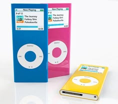 two colorful ipods sitting next to each other