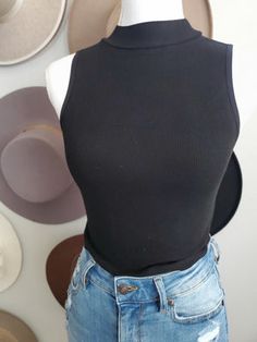 Black High Neck Halter Top For Spring, Spring Black High Neck Halter Top, Casual Mock Neck Top For Night Out, Casual Mock Neck Top For Spring Night Out, Trendy Turtleneck Mock Neck Top For Night Out, Trendy Turtleneck Tank Top For Spring, Trendy Tank Crop Top For Fall, Black High Neck Tank Top For Spring, Casual Mock Neck Top For Night Out In Spring