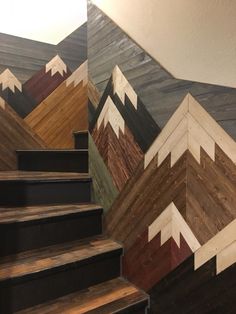 some stairs painted with different colors and designs