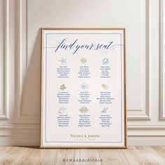 a blue and white poster with the words find your seat on it in front of a wall