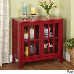 a red cabinet with glass doors and candles on top is featured for holiday joy is happening on ebay