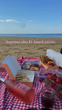 a picnic on the beach with strawberries and bread