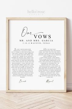 the wedding vows are printed in black ink on a white background with a wooden frame