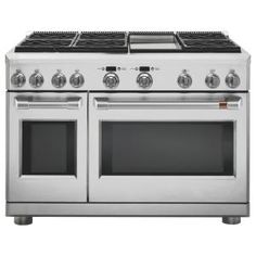 an oven with four burners and two doors on the front, in stainless steel