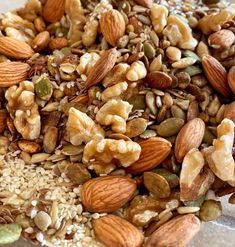 nuts and seeds are mixed together in a bowl