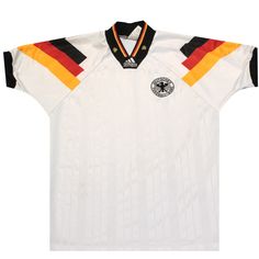 a white shirt with black, yellow and red stripes