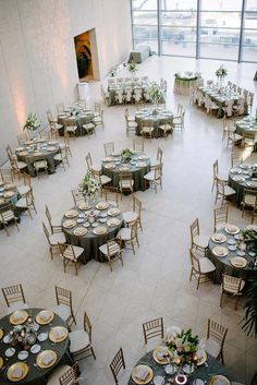 an overhead view of a banquet hall with tables and chairs set up for formal function