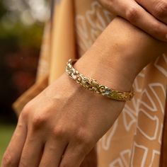 Adorned with tropical flowers, ferns, leaves and intricate scrollwork, our unique Hawaiian Heirloom designs are cherished Island keepsakes with tradition that traces back to Hawai‘i’s Queen Lili'uokalani. Hawaiian Heirloom Plumeria Design Hinge Bracelet with safety clasps 14k Yellow Gold, 14k Rose Gold and 14k White Gold Natural Diamond: 0.075 CTW 8mm Thickness Exclusively Made in Hawaiʻi Forever Guarantee (Warranty on the life of the piece) Free Shipping on USA Orders $100 or more Heirloom Filigree Gold Bracelet Gift, Hawaiian Heirloom Rings, Hawaiian Heirloom Jewelry Bracelets, Hawaiian Jewelry Traditional, Hawaiian Bangles Gold, Plumeria Design, Hinge Bracelet, Popular Bracelets, Hinged Bracelet