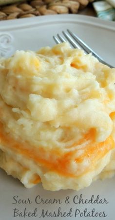 a white plate topped with mashed potatoes