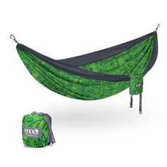 a green hammock and backpack sitting next to each other