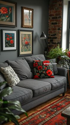 a living room filled with lots of furniture and pictures on the wall next to a window