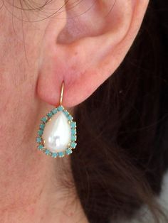 "Pearl and turquoise crystal drop earrings, white pearl halo teardrop earring, Bridal earrings, Bridesmaids gifts, Dangle earrings, gold Elegant and refined. They are made of gold plated brass and Swarovski crystals and acrylic pearls, all set in prong setting. Made with CRYSTALLIZED™ - Swarovski Elements Each teardrop is approx. 19 x 15 mm Total earrings' length is 30 mm (1.2 inch) AVAILABLE IN STUD VERSION AS WELL. JUST CHOOSE AT \"VERSION\" BOX. MATCHING NECKLACES ARE AVAILABLE. Please contac Pearl Halo, Earring Bridal, Pearl Cluster Earrings, Petite Earrings, Emerald Green Earrings, Dangle Earrings Gold, Turquoise Crystal, Bridal Earrings Pearl, Emerald Earrings