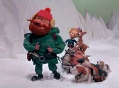 a group of toy figurines in the snow