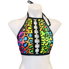 RAINBOW KITTY HALTER  Includes a keyhole halter top with adjustable ties around the neck and back. RAINBOW KITTY is a 4-way stretch polyester spandex blend, which fits tight and stretches to include a variety of body types. Fabric pattern can vary from item to item. Our products are made to order, please review our store policies before purchasing because refunds are not available after purchase. International shipping available. Keyhole Halter Top, Stretch Halter Top For Music Festival, Stretch Halter Top With Tie Back And T-back, Stretch T-back Halter Top For Festival, Trendy Stretch Halter Top For Festivals, Fitted T-back Halter Top For Sports, Sports T-back Halter Top, Adjustable Multicolor Triangle Halter Top, Fitted Multicolor T-back Halter Top