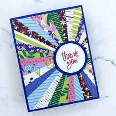 a thank you card made with colorful paper