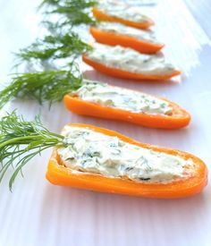 four stuffed peppers with cream cheese and dill