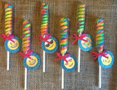 colorful lollipops with smiley faces on them