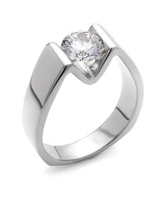 a white gold ring with a single diamond