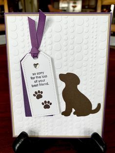 a card with a dog tag attached to it