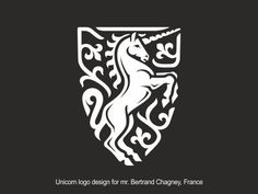 the unicorn logo is shown in white on a black background, with an ornate design