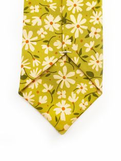 A mossy green handmade necktie with cream flowers, showcasing shades of earthy browns and pops of warm peach and blush pink. This necktie merges retro charm and boho vibes, perfect for both formal events and casual gatherings. Each tie is carefully hand stitched, so no two ties are exactly alike. This boho necktie can really make your suit stand out! Complete the look with the matching pocket square sold separately here. Do you know someone who loves boho, retro style? This necktie can make a gr Green Floral Tie Wedding, Sage Green Necktie, Green Spring Ties, Classic Floral Print Ties, Floral Necktie, Mossy Green, Boho Retro, Boho Headband, Cream Flowers