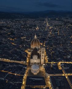 an aerial view of a city at night