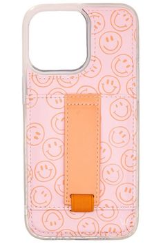 an iphone case with a smiley face pattern on the front and orange leather clipping