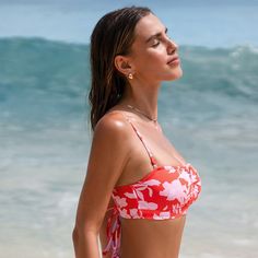 Make a splash with our bright red bandeau bikini top, featuring pink tropical patterns. With removable, adjustable cami straps, it's perfect for sunbathing or added support. Stylish and comfortable, this top is a must-have for your next beach getaway! Product Code: DAA12A4G007KD Tropical Strapless Swimwear, Tropical Strapless Swimwear For Swimming, Strapless Tropical Print Swimwear, Red Swimwear With Removable Bra Pads For Vacation, Tropical Strapless Swimwear For Beach, Bandeau Swimwear With Straps For Summer, Strapless Summer Swimwear With Tropical Print, Strapless Swimwear With Tropical Print For Beach Season, Tropical Bandeau Swimwear For Summer