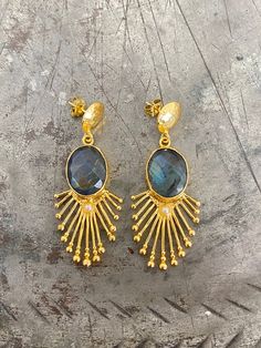 21 ct gold plated brass. labradorite semi-precious stone earrings length - app 5,8 x 2,3cm Designed by our Turkish designer. Handcrafted with great care. Gold Labradorite Earrings With Natural Stones, Gold Labradorite Drop Earrings, Handmade Gold Labradorite Earrings, Elegant Labradorite Drop Earrings, Gold Labradorite Earrings, Turkish Earrings, Labradorite Earrings, Earring Stud, Statement Earring