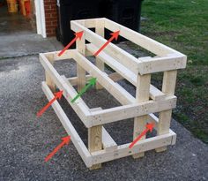 an unfinished bench with arrows pointing to the top