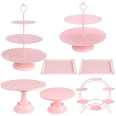 pink cake stands, plates and trays with scalloped edges on white background