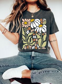 "Flowers Tshirt, Boho Wildflowers, Floral Shirt, Comfort Colors® Shirt, Nature Lover Gift, Botanical Shirt, Garment Dyed, Oversized Shirt Hi! WELCOME TO DELUXSTOREUSA This is a standard unisex size Comfort Colors Tee. For an oversized tee, please size up. Please review the size chart to ensure you receive the fit you want.   Washing Care Instructors Use cold water when washing, do not use bleach, do not dry clean, and do not use an iron directly on the design.  Production Time Production time is 1-2 days. Delivery time varies depending on your delivery address. How to Order?   Please, choose your favorite color and size from the pop-up window.  Select the quantity that you want.  Click \"ADD TO CART\".  You can go back to add more product color for your loved ones members.  You can complet Nature Vintage, Botanical Shirt, Shirt Oversize, Nature Shirts, Aesthetic T Shirts, Boho Shirts, Flower Shirt, Boho Vintage, Looks Vintage